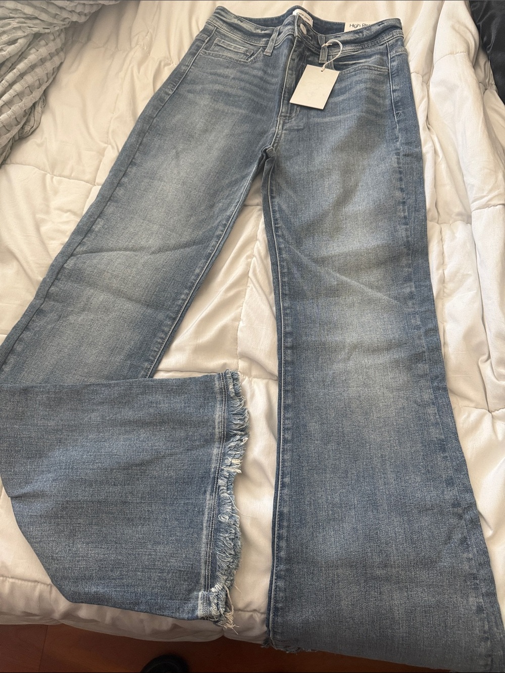 Light Blue Women's Flared Jeans with Raw Hem